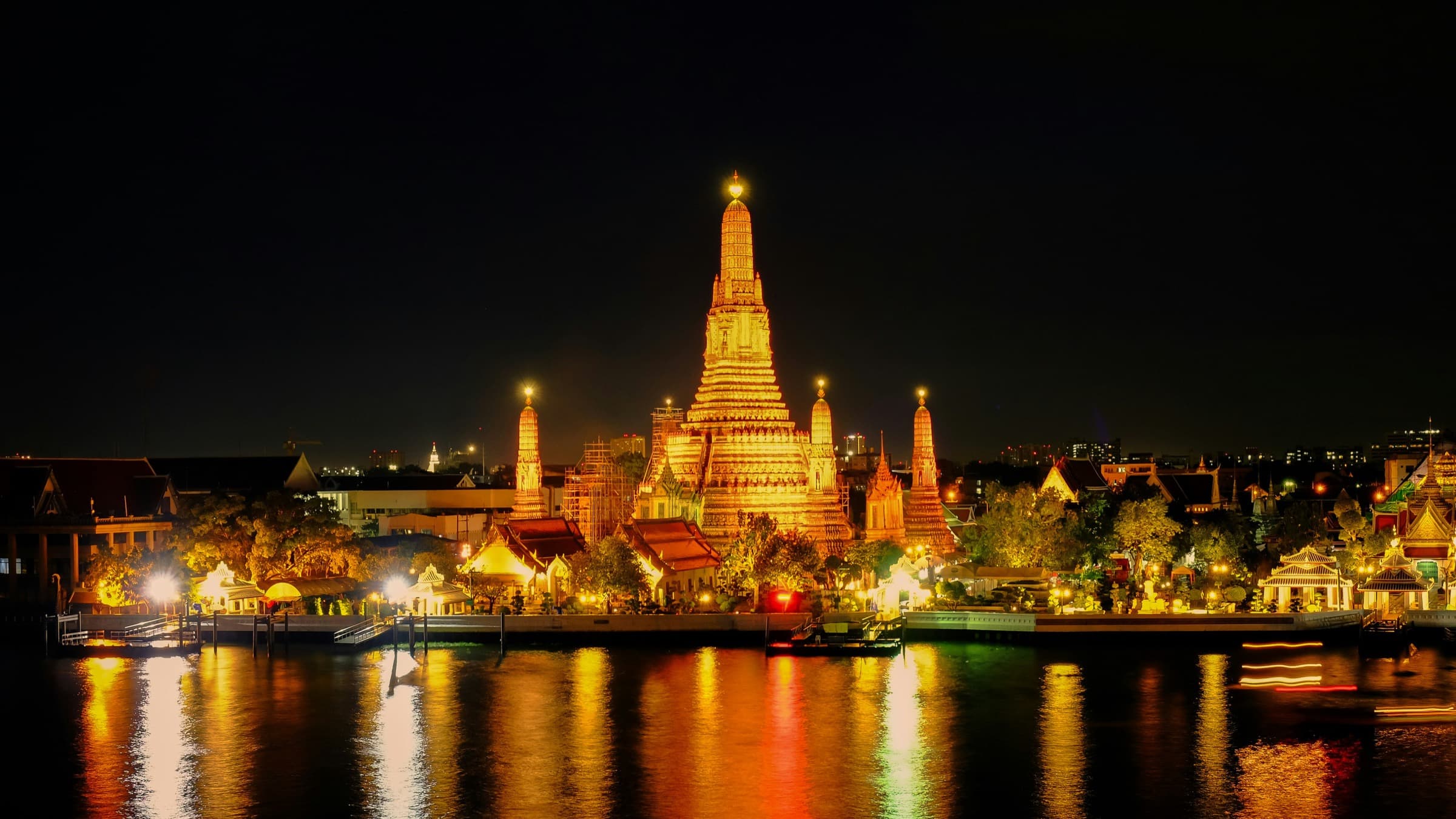 Temples and golden spires of Thailand at golden hour